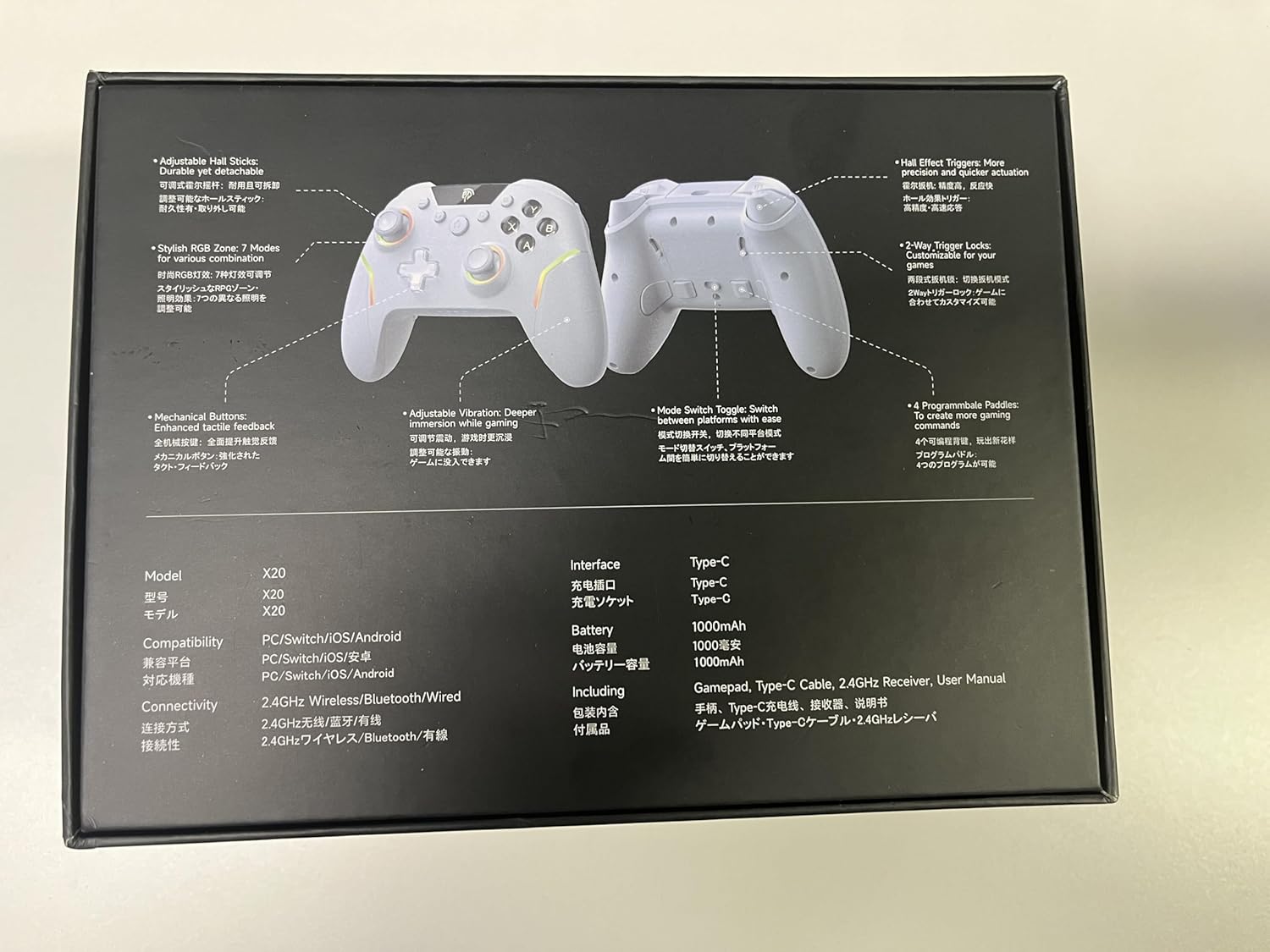 EasySMX X20 Product packaging with white gaming controllers and technical specifications on a black background