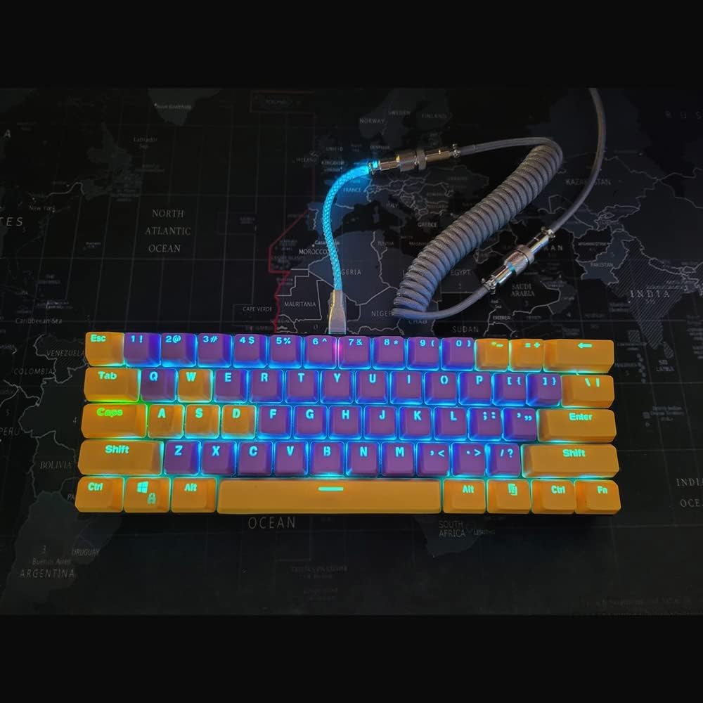 Glowing keyboard with colorful backlighting on a world map background