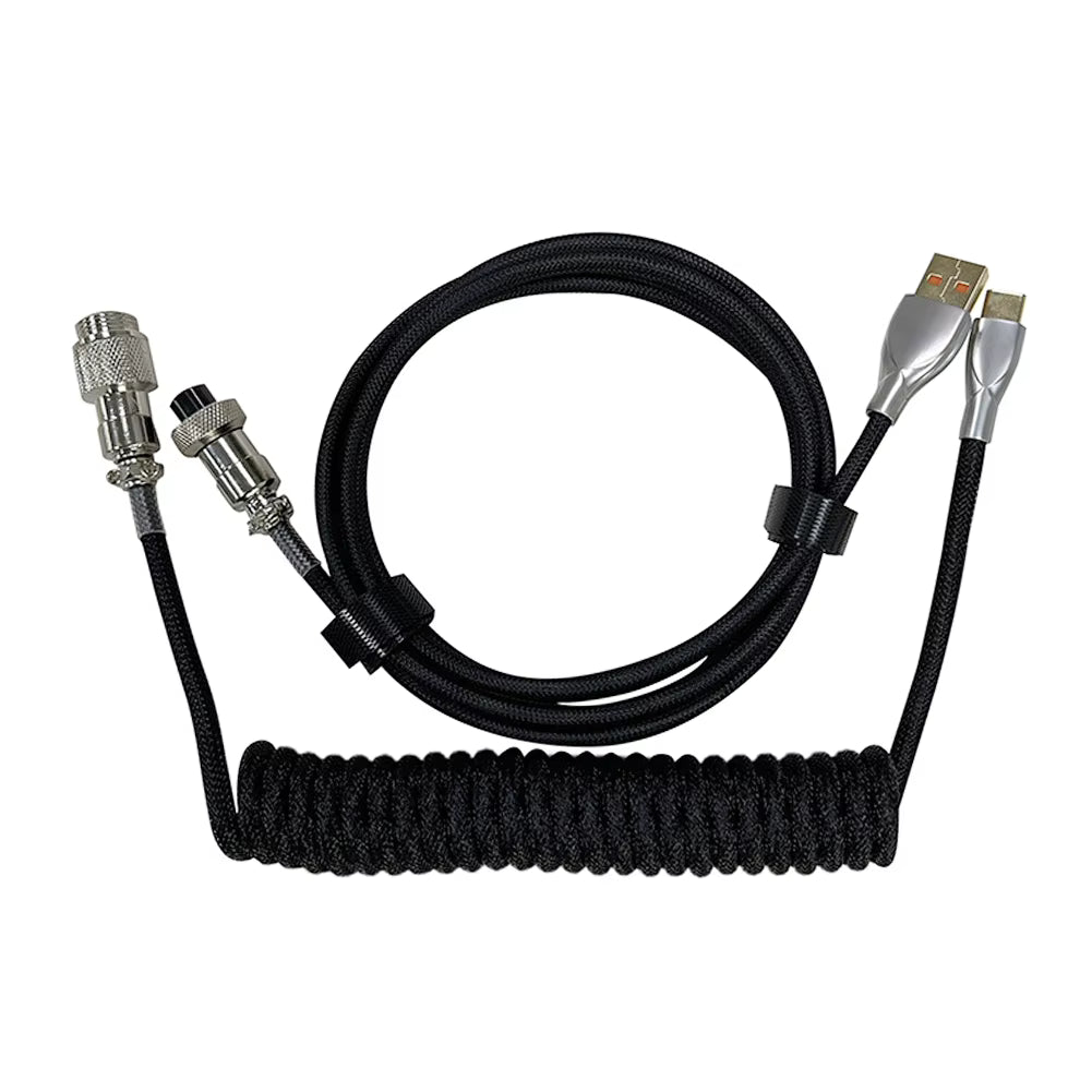 Macaron Black coiled cable with metallic connectors on a white background