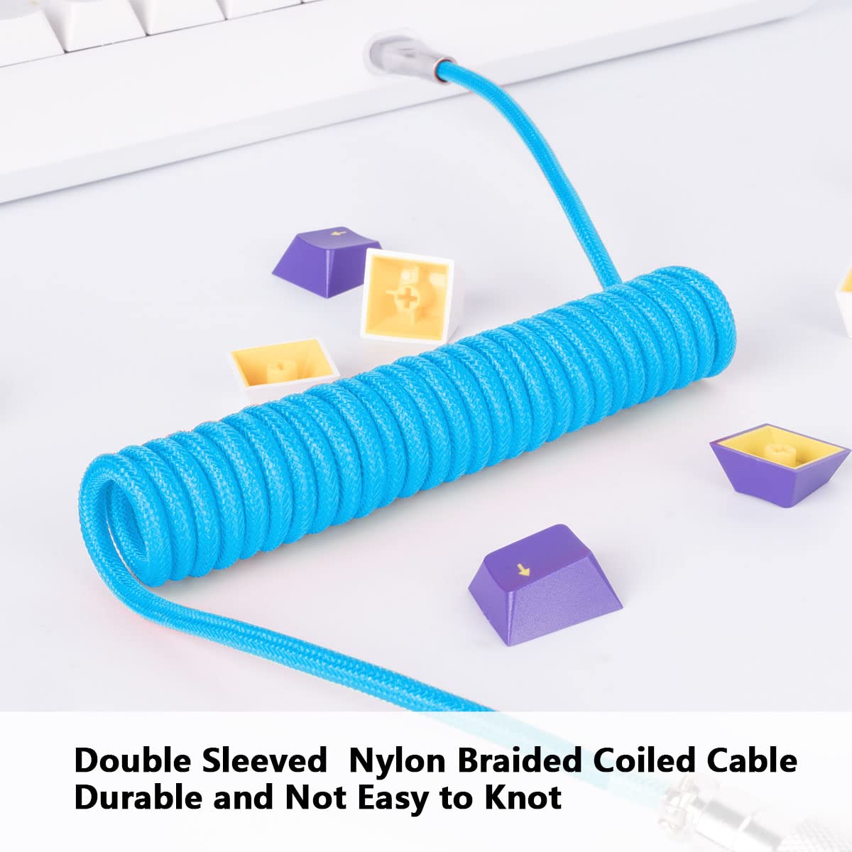 Macaron Blue coiled cable on a white background with text describing its features.